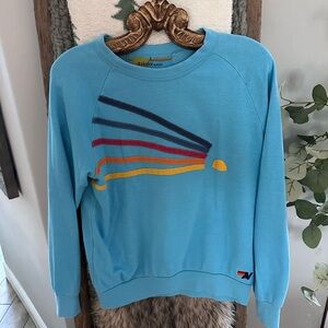 Aviator Nation Blue Sweatshirt with Rainbow Stripes
